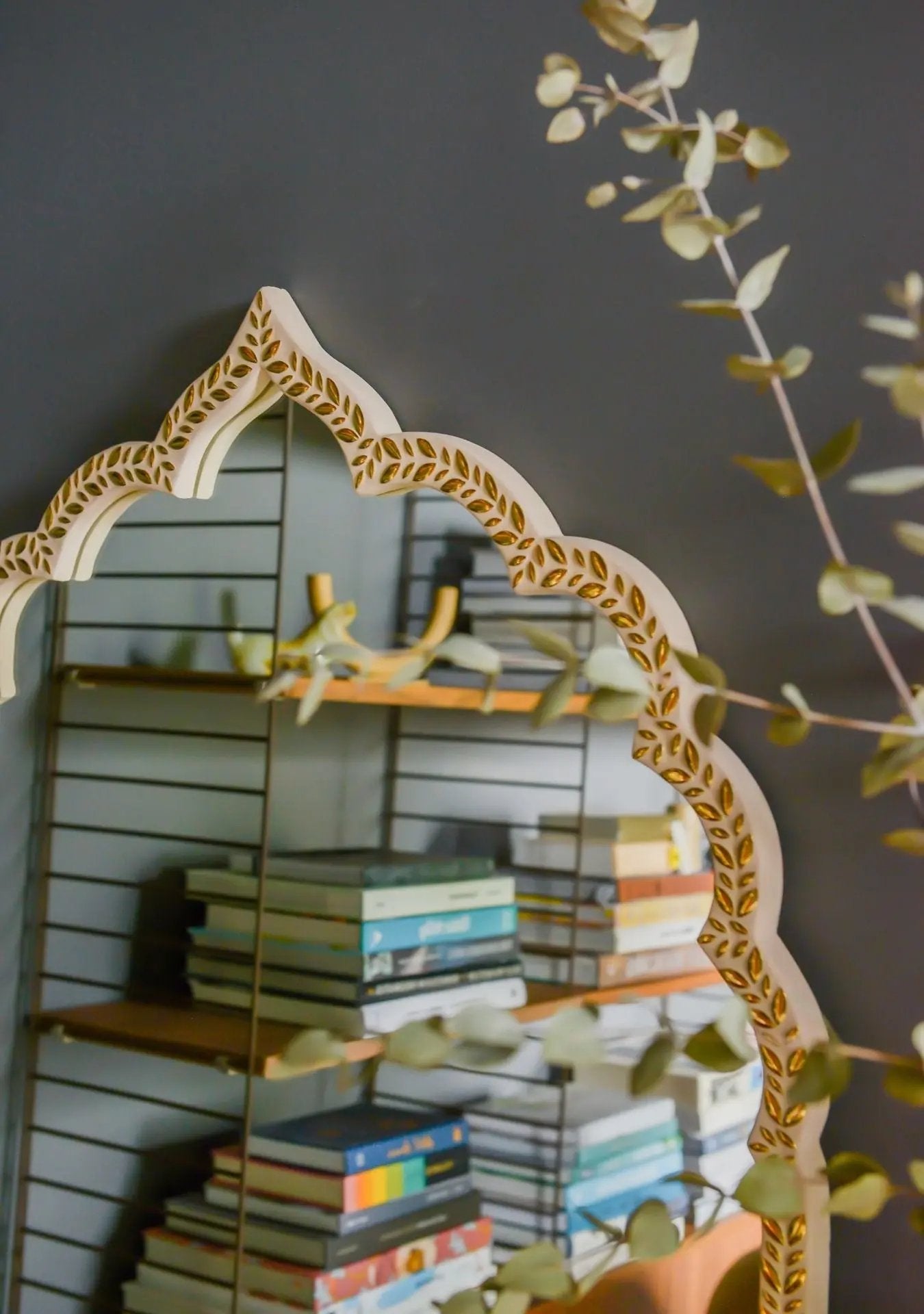 Close-up of golden mosaic craftsmanship and artisan grout texture.