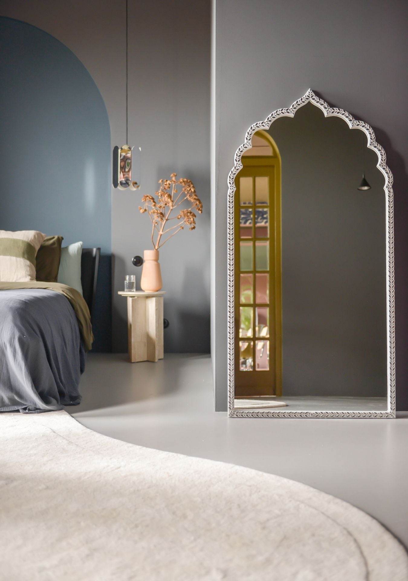 Mirror Clarity Silver styled in a calm, modern interior with soft lighting.