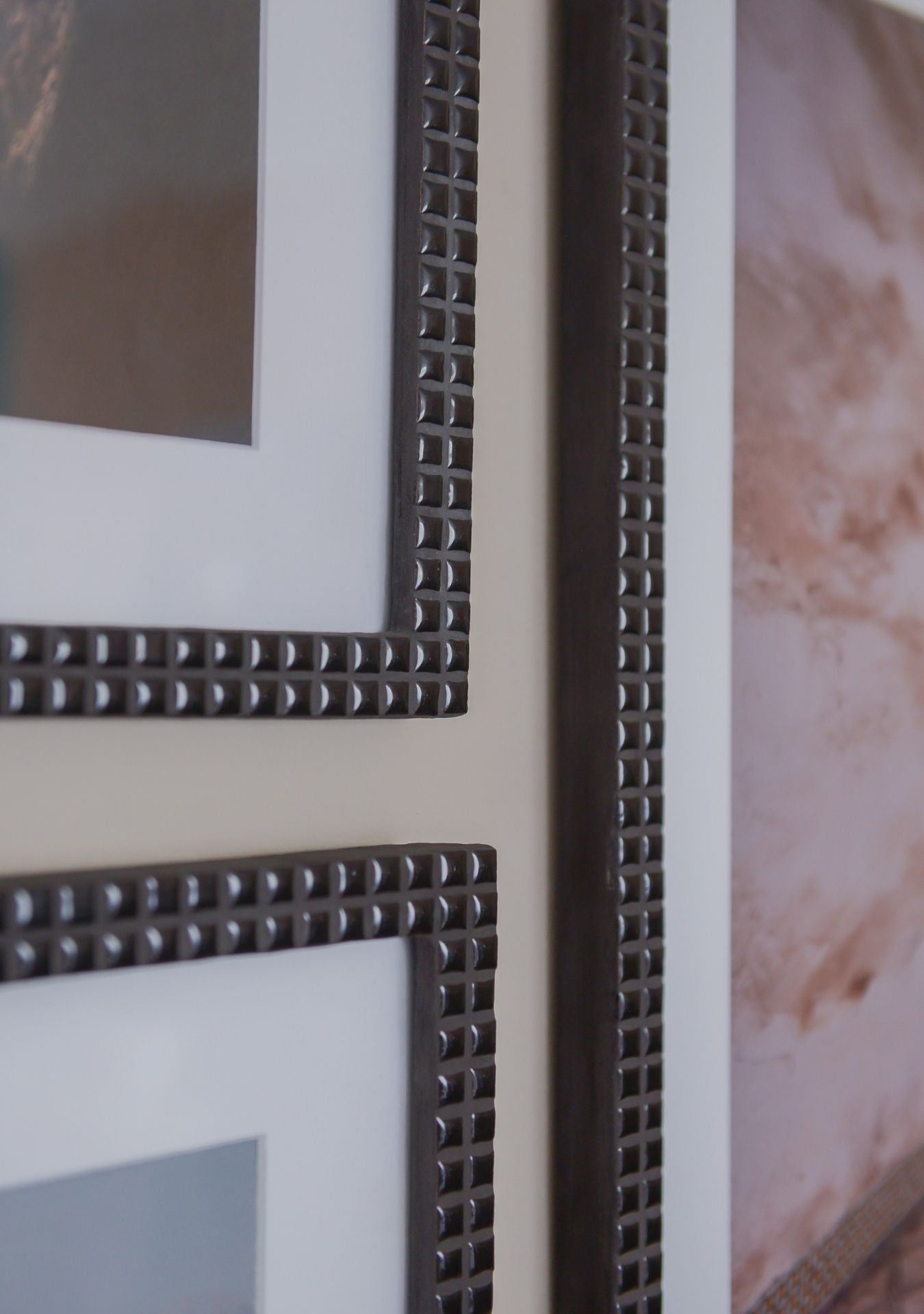 Detail of handmade black mosaic photo frame with ceramic grout – Pure Reflection