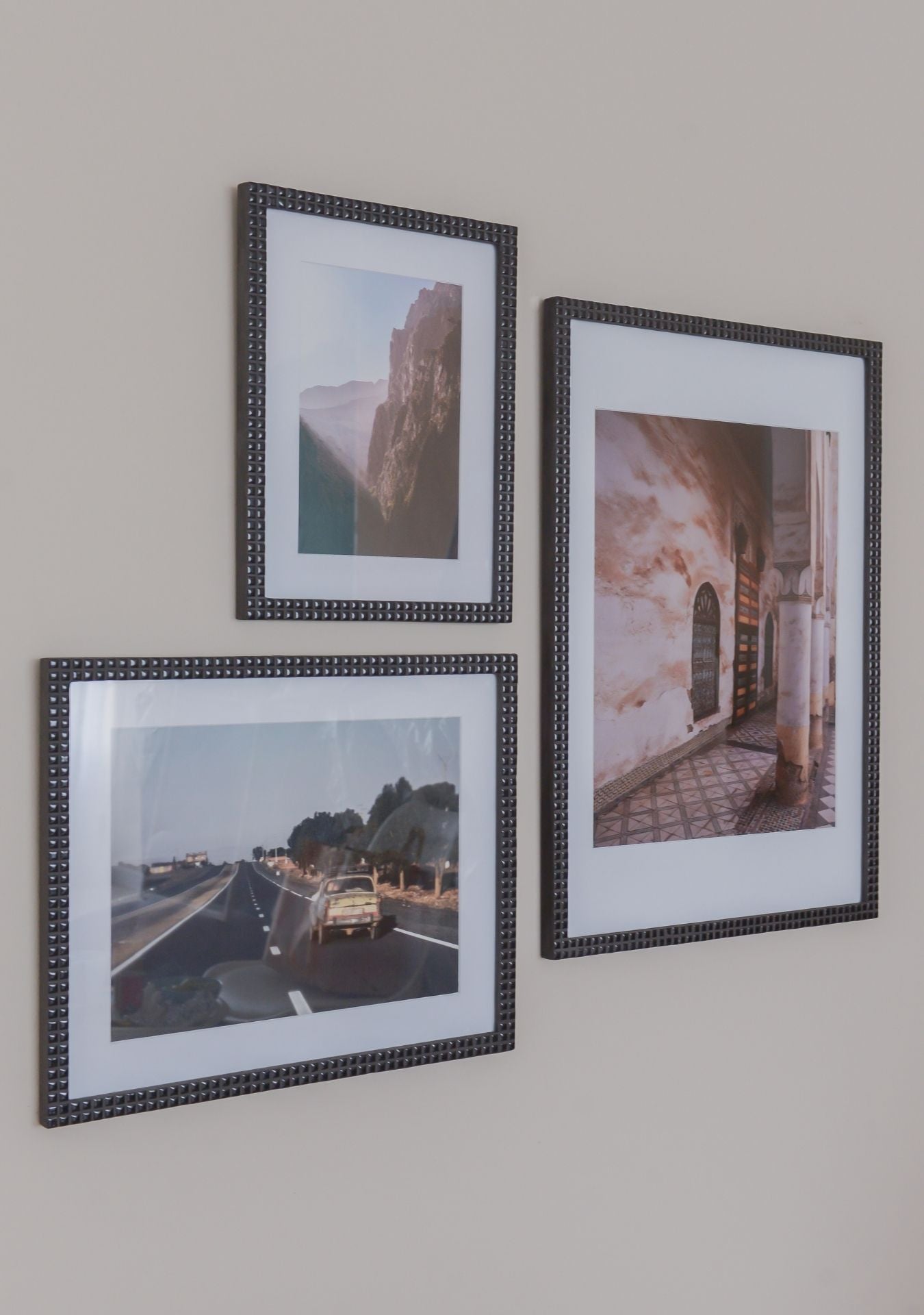 Set of handcrafted black mosaic photo frames on wall – Pure Reflection