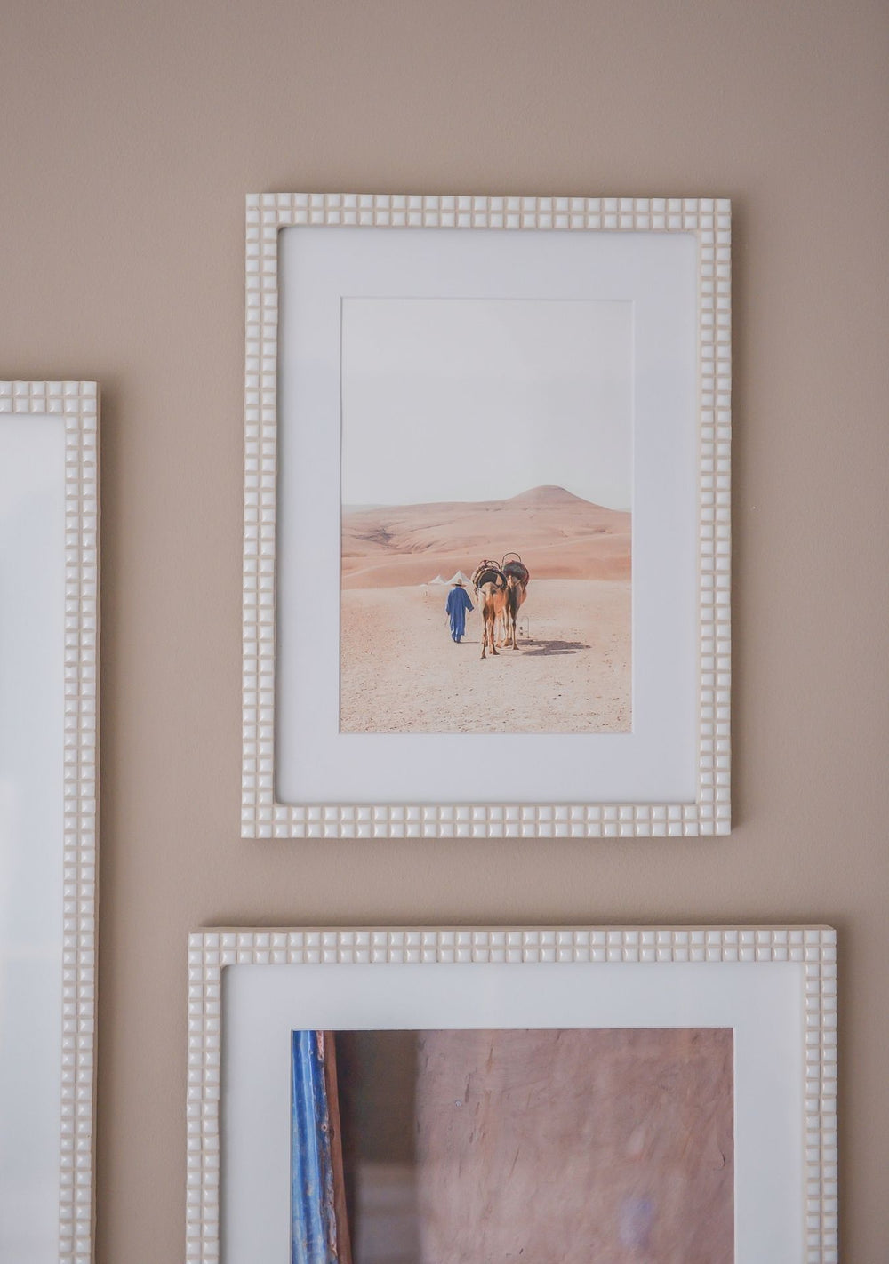 Minimal wall composition with handmade white mosaic photo frames – Pure Reflection