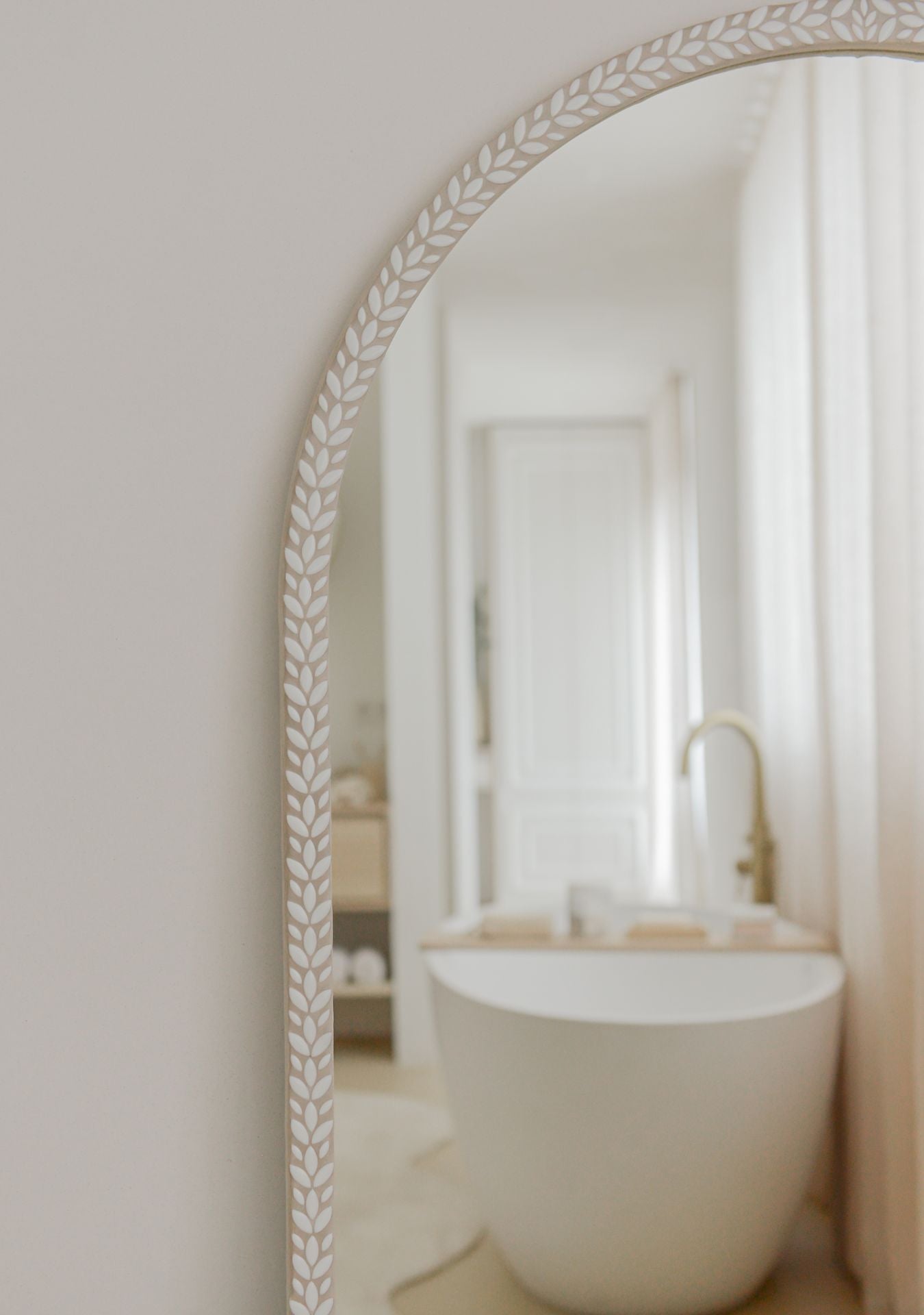 Pure Reflection white designer mirror blending art, craftsmanship and inner calm.