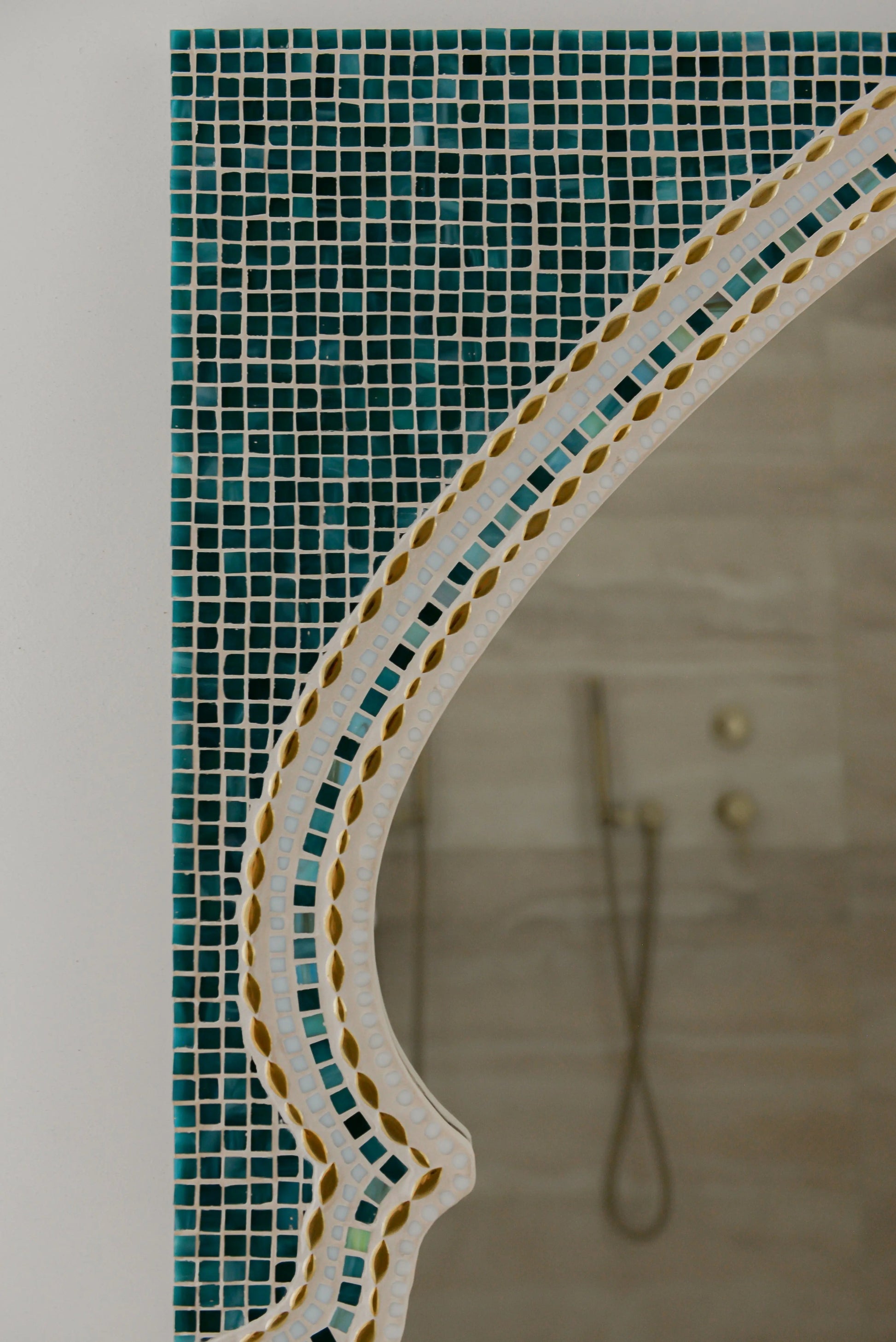 Close-up of Maraya Green mosaic mirror showing ceramic tiles and fine grout details.