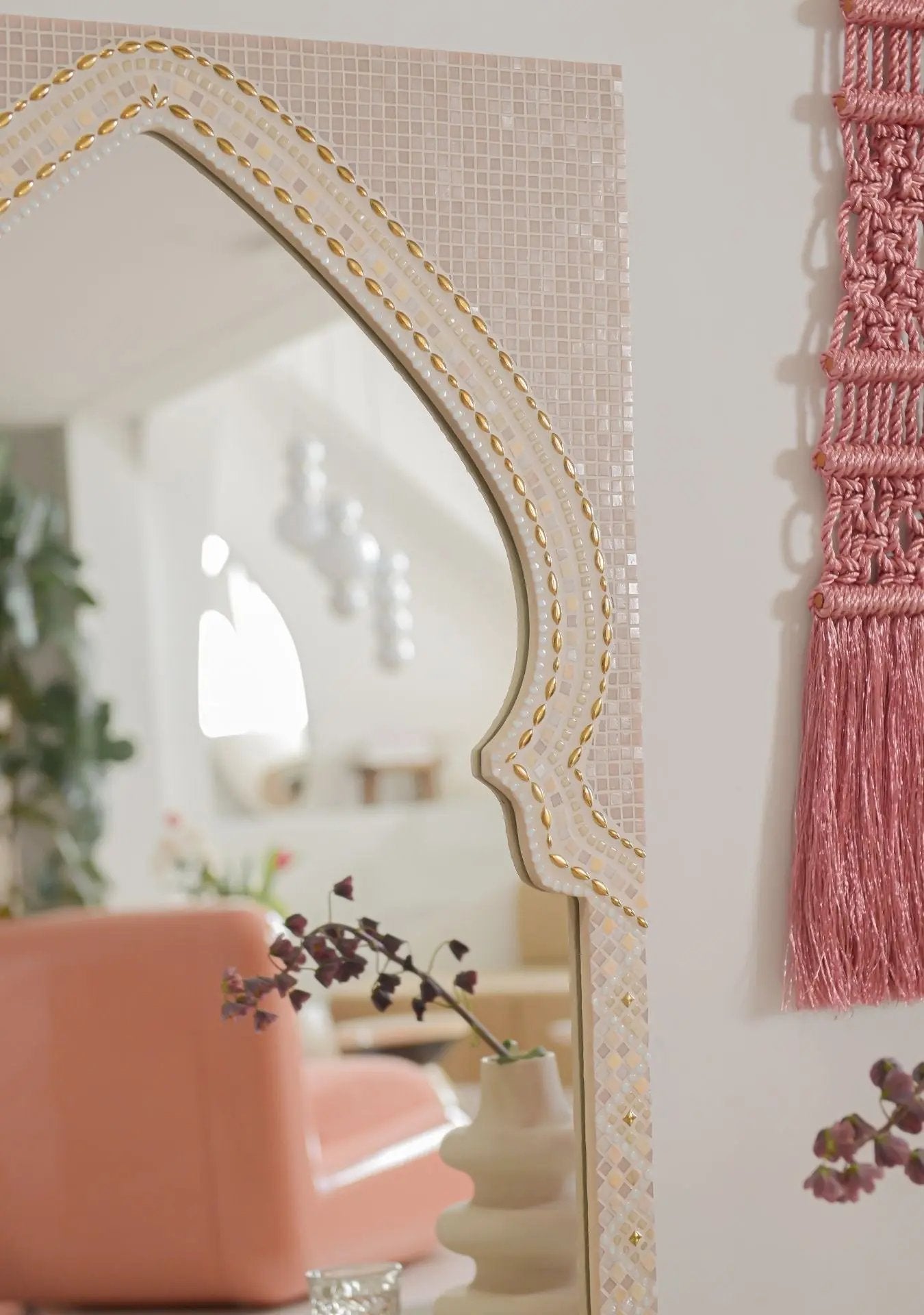 Close-up of pink mosaic details and artisan craftsmanship on the Maraya mirror.