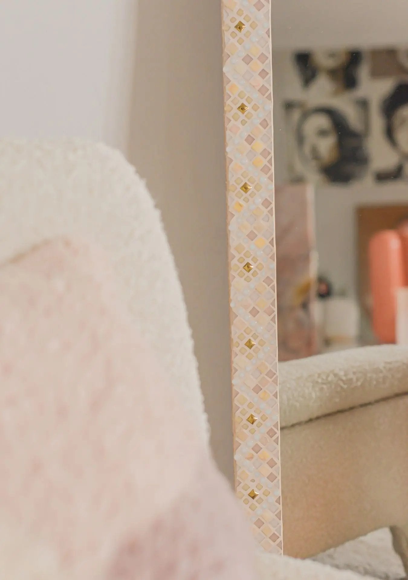 Detail of the mosaic edge and grout texture of the Maraya Pink mirror.