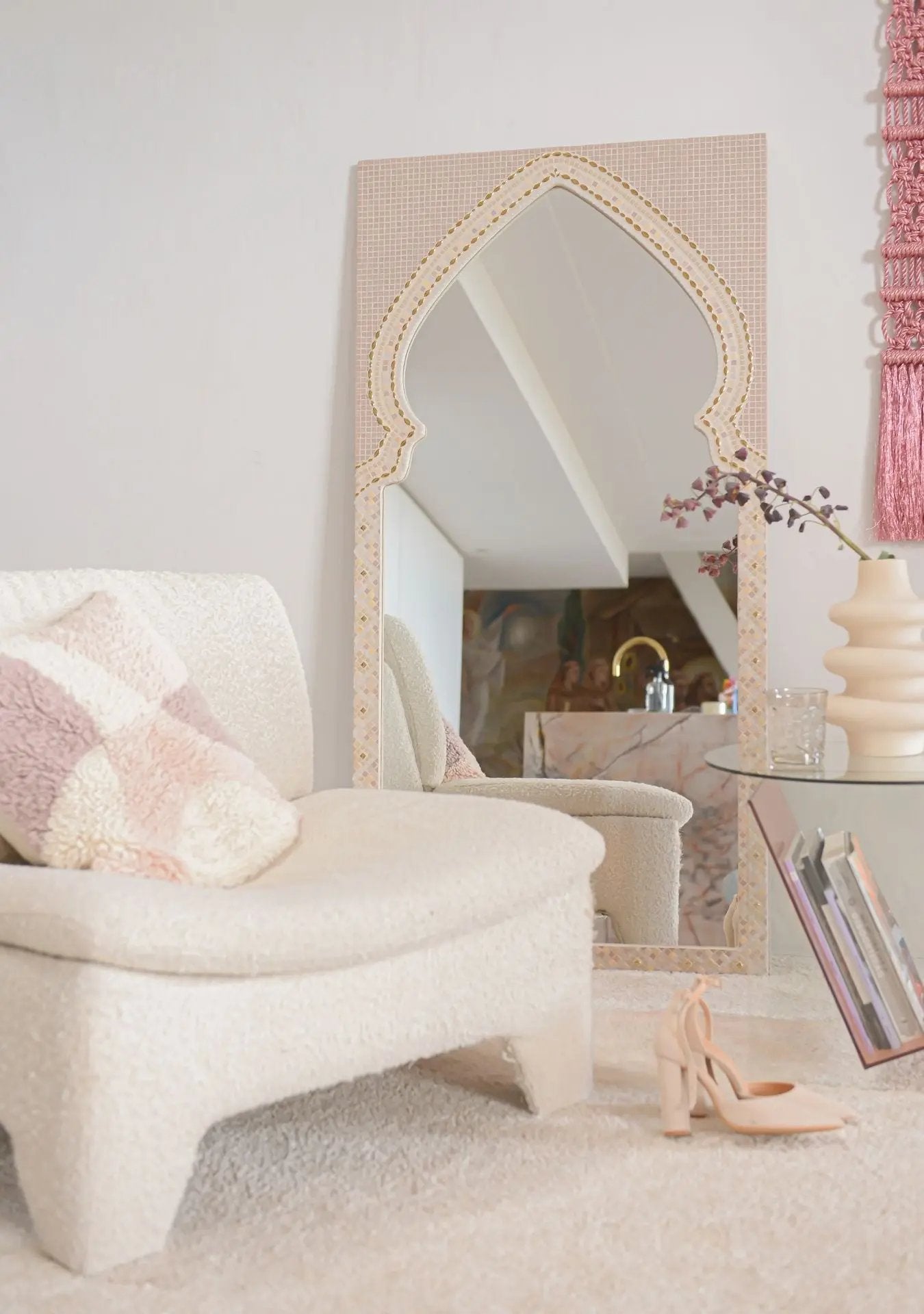 Handmade mosaic mirror in soft pink tones, styled in a serene living room with natural light.