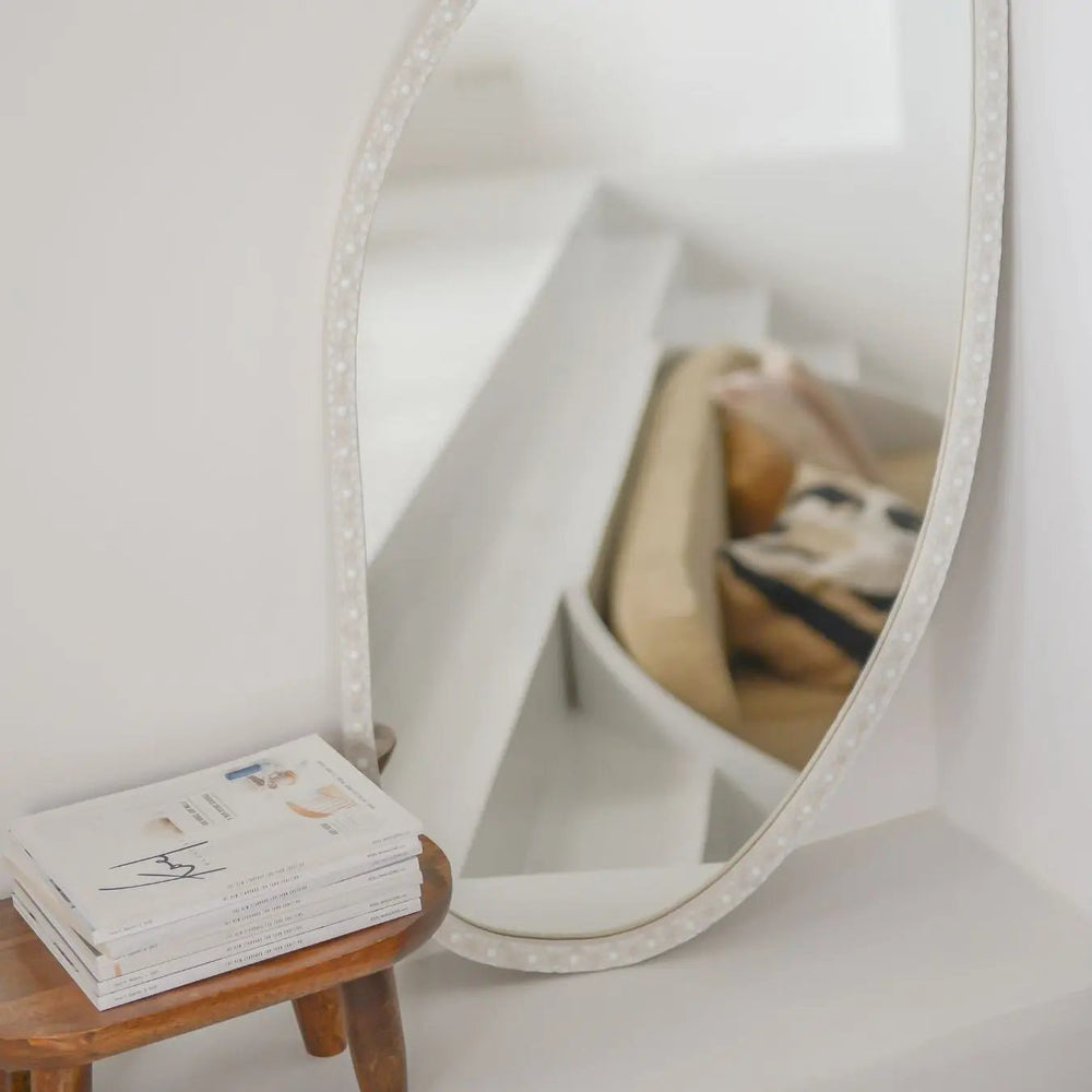 Artisan-made white mosaic mirror that blends art, design and self-reflection.