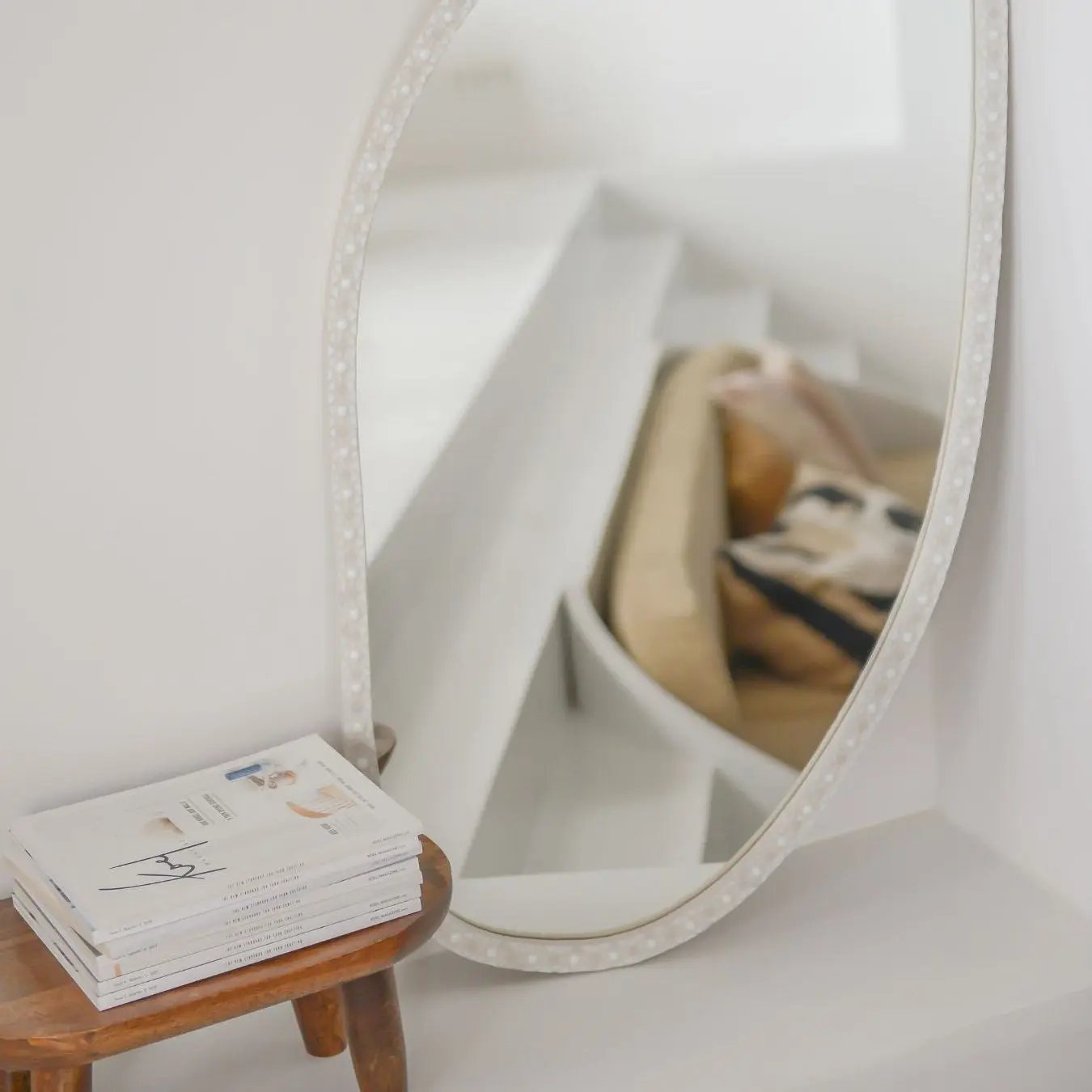 Artisan-made white mosaic mirror that blends art, design and self-reflection.